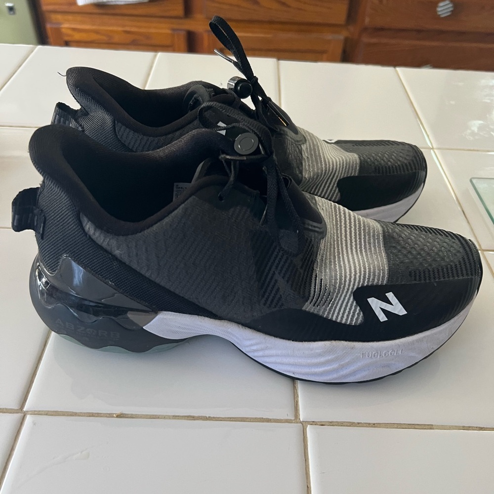 New Balance Black and White Athletic Sneakers